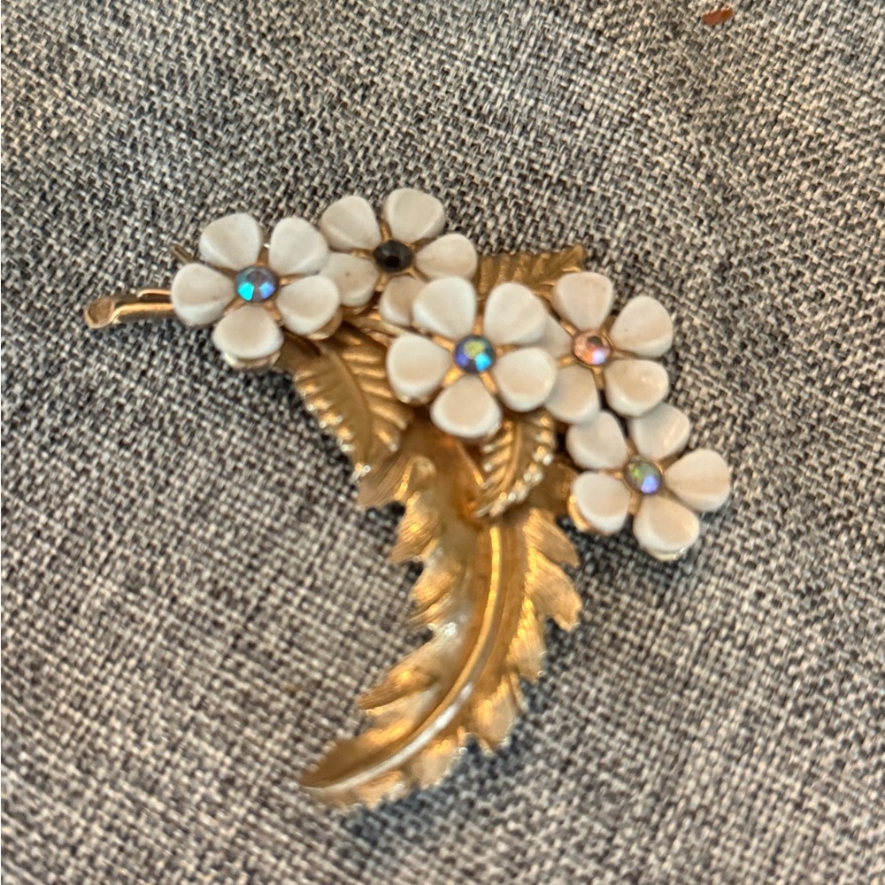 Elegant Gold and White Floral Brooch